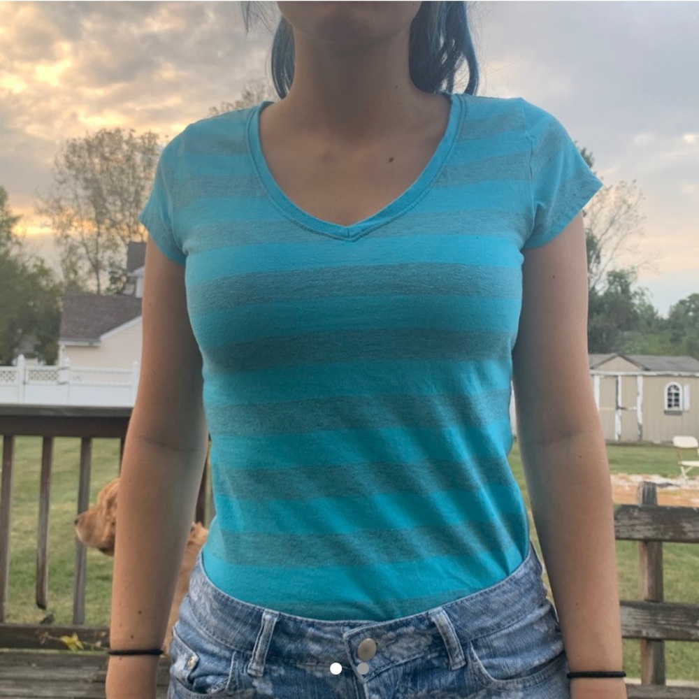 blue striped v neck shirt